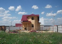 Дом из профилированного бруса с эркером